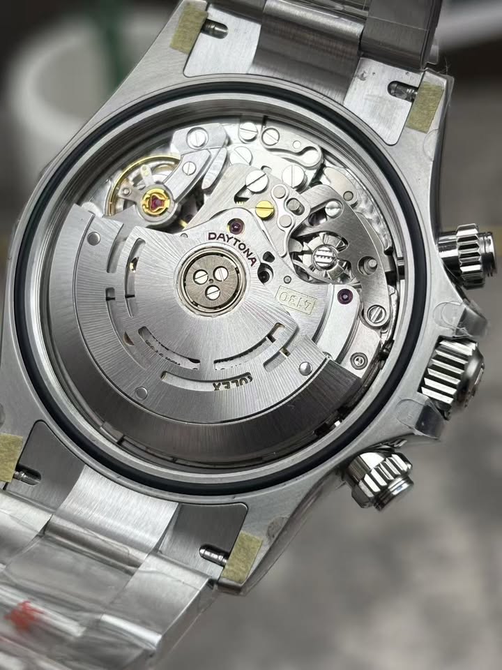 Daytona watch with a white "panda dial," powered by the Calibre 4130.